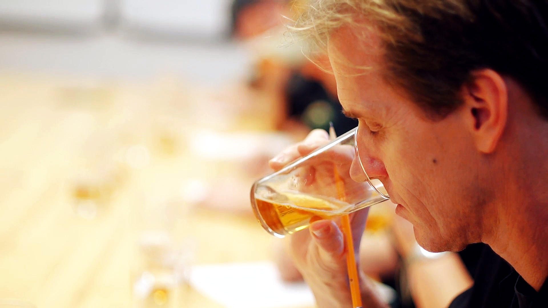 Beer Proficiency Testing And Sensory Analysis Instructor Tom Shellhammer analyzing the scent of beer.
